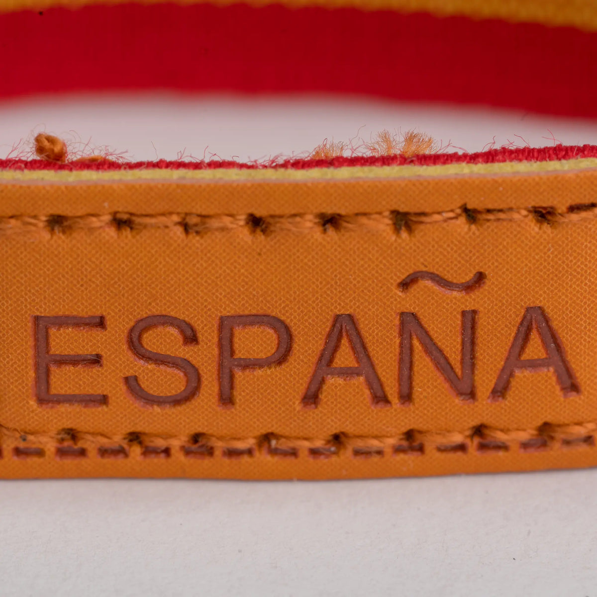 Comprar Pulsera elástica Bandera España pieza piel grabada ESPAÑA La Flamenca de Borgoña Bandera España